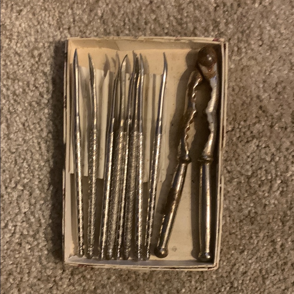 Elegant Silver Nutcracker and Picks Set